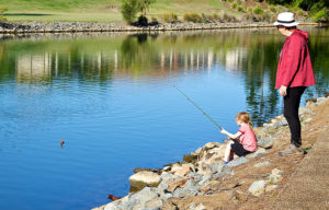 child learning to fish